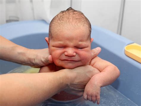 Wipe each eyelid, from the inside to the outside corner. Baby Bath Basics | BabyCenter