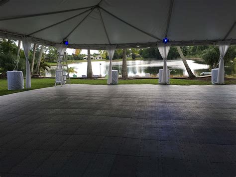 Unique array of tents with dance floor and cafe lights in the middle. Design 45 of Outdoor Wedding Dance Floor Rental | cfu-vngu6