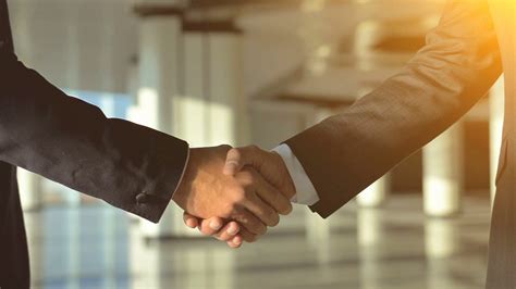 The Two Business People Handshake On Sunny Stock Footage Sbv 319105442 Storyblocks