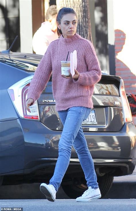 Mila Kunis Embraces Her Casual Style In Pink Sweater And Denim As She