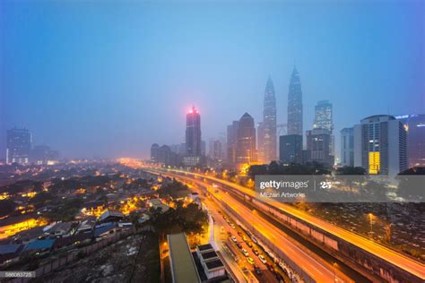 Photo by firdaus latif/wikimedia commons. Blue hour morning at Kuala Lumpur city centre during ...