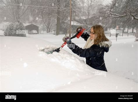 Shoveling Snow Scraping Car Windshield Stock Photo Alamy