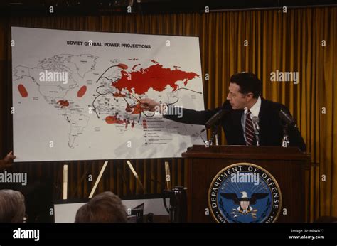 Secretary Of Defense Caspar Weinberger Uses Charts And Maps And Photos
