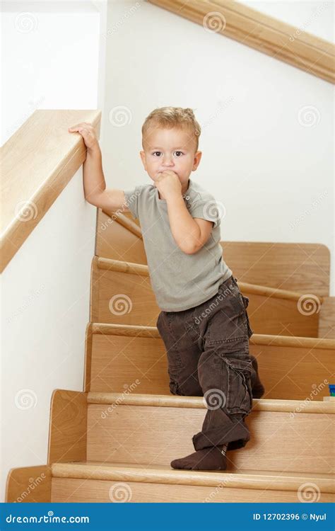Little Boy Standing On Stairs Stock Photo Image Of Cute Casual 12702396