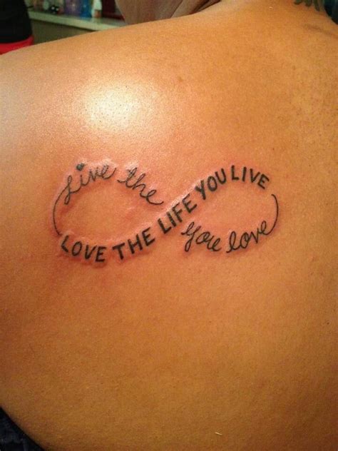 Another great live laugh love tattoo design. Live the life you love. Love yhe life you live | Tattoos ...