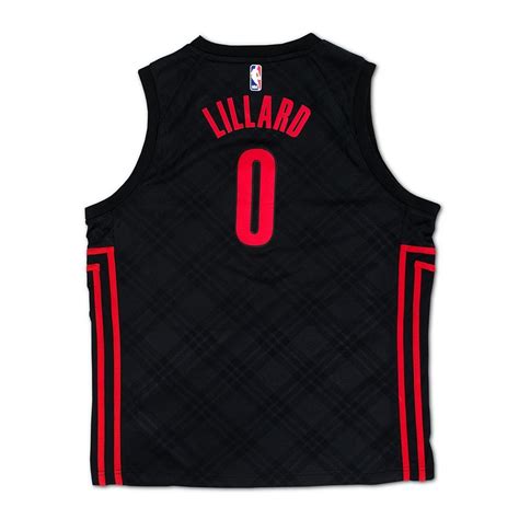 Among the sea of black and red jerseys, disco outfits, and stylish suits straight from the 1970s, one custom jersey stood out like a sore thumb: Nike swingman jersey City Edition ES Portland Trail ...
