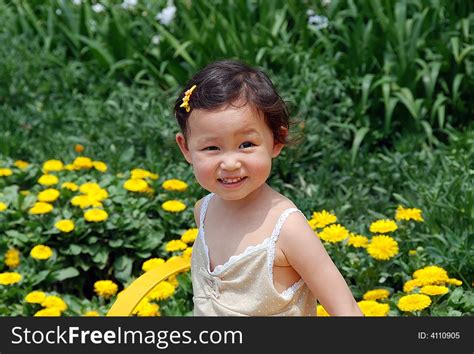 Beautiful China Girl In Flowers Free Stock Images And Photos 4110905