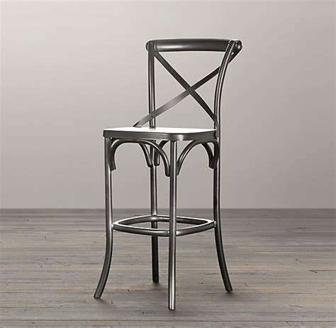 Fashioned with a backless silhouette, this compact barstool is easy to move around and tuck under your kitchen island. Metal Madeleine Stool