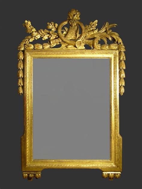 Miroir en bois doré et sculpté d'époque Louis XVI - XVIIIe ...