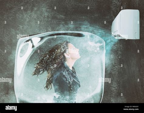Woman Frozen In An Ice Cube Under The Air Jet Of An Air Conditioner