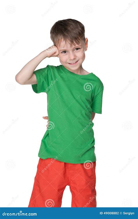 Cute Little Boy Stands Against The White Stock Photo Image Of
