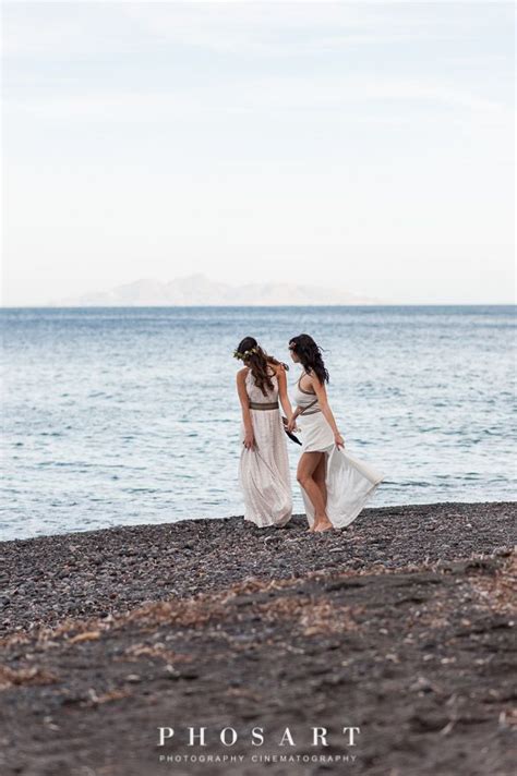 Pin On Sun And Sea Lesbian Santorini Wedding Engagement On The Shores Of