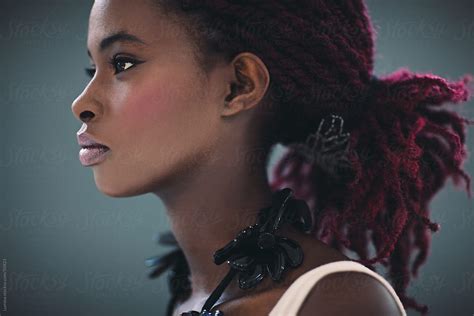 african woman with pink dreadlocks by stocksy contributor lumina stocksy