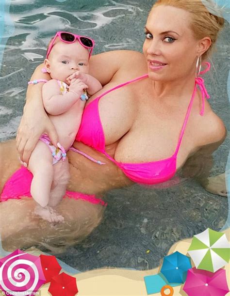 Coco Austin Puts On A Very Busty Display In A Pink Bikini