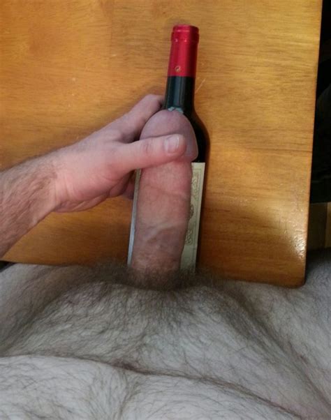 Photo Comparing Cock With A Wine Bottle Page Lpsg