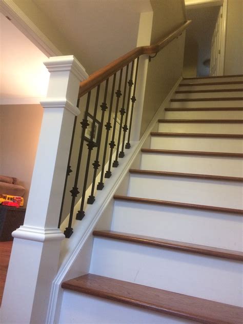 Home / wrought iron components / balusters spindles. Wood railing with wrought iron balusters - Lux Design and Contracting
