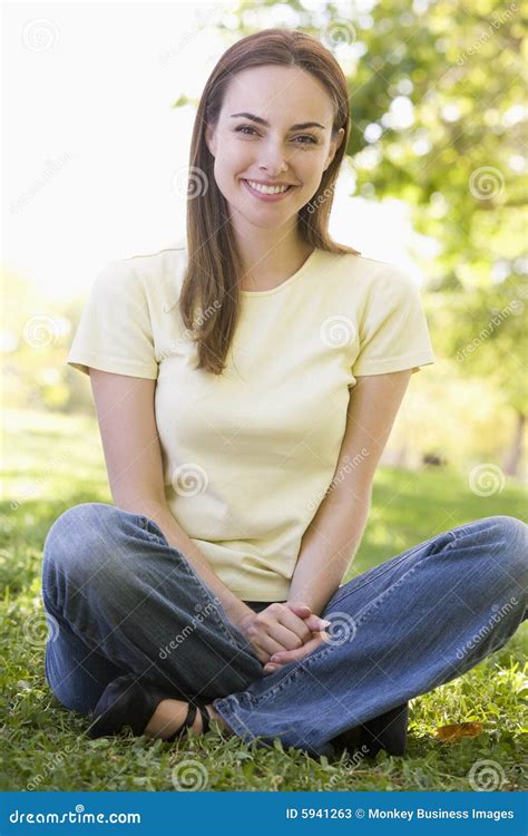 Woman Sitting Outdoors Smiling Stock Image Image Of Portrait Thirties
