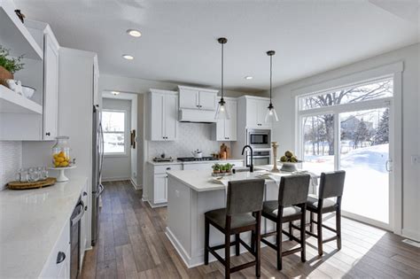 To maximize the outdoor view, i put in very few upper cabinets and installed most of the new appliances below the counters. Open Concept Kitchen with Large Island for Entertaining ...