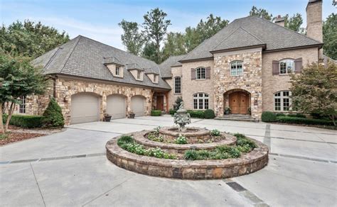 Our unique, luxurious living spaces feature attached located in a very nice and safe neighborhood. Brick & Stone Home In Duluth, Georgia | Homes of the Rich