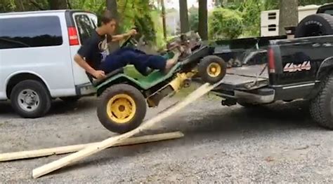 Guy Almost Falls While Unloading Atv Off Truck Jukin Licensing