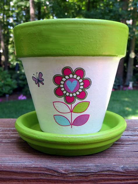 Pin By Linda Overton On For My Garden Decorated Flower Pots Painted