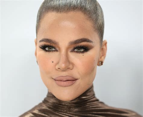 khloe kardashian looks unrecognizable as she shows off massive pout and very chiseled jawline in