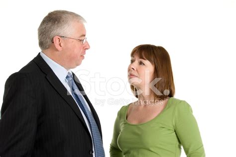 Middle Aged Couple Seriously Talking Stock Photo Royalty Free