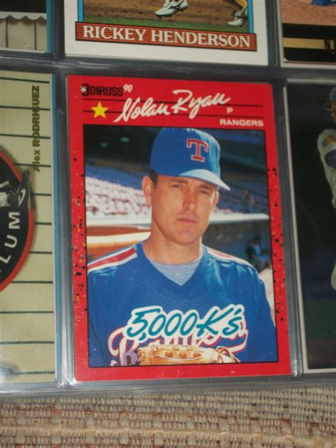 Dean's cards is always buying vintage sports cards. Nolan Ryan 1990 Donruss baseball card- "5000 K's"
