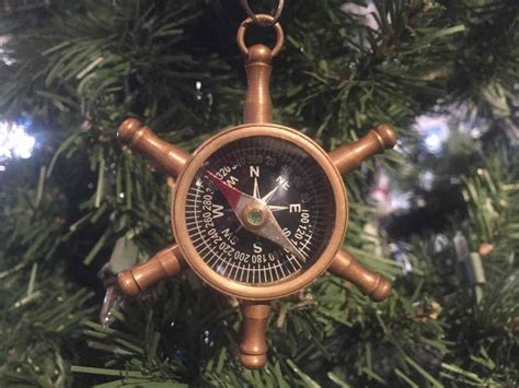 It is mounted on a bronze stanchion allowing it to be set in the deck of the boat at the helm and removed in harbor. Buy Antique Brass Ship's Wheel Compass Christmas Ornament ...