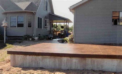 The concrete building foundation for your house or structure supports everything above it in one way or another. A Raised Patio Colored Slab and Foundation | Forward ...