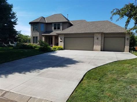 Many factors go into installing a driveway heating system, such as what kind of system you want, how expensive the materials are in your area and whether you currently have a driveway in place. A Homeowner's Guide to the Average Cost of a Concrete Driveway