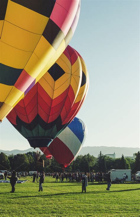 Three Assorted Coloured Hot Air Balloons · Free Stock Photo