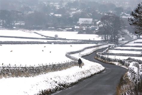 Snow Blankets Britain In Pictures Pedestrian Walk Wintry Weather
