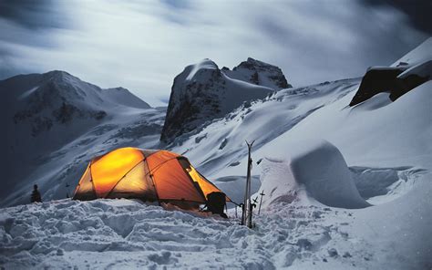 Illuminated Tent Of Winter Camp In The Mountains Snow Camping