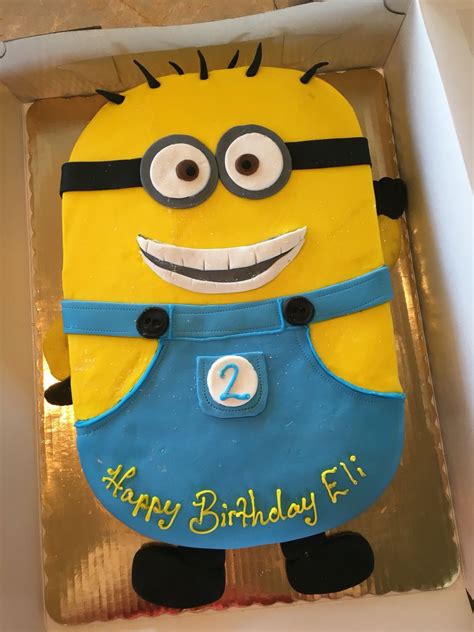 Making a 3d minion cake 1. Minion sheet cake | Sheet cake, Minions, Cake images