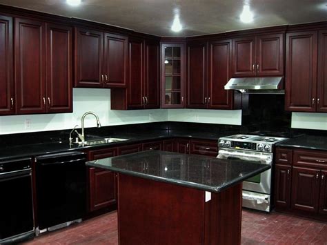 Pictures of kitchens with dark cherry cabinets, floors black appliances traditional. Cherry cabinets black granite photos