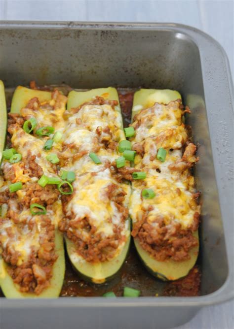 Zucchini taco boats are easy to make and are a fun way to put a healthy twist on taco night! carmen's kitch: Taco Stuffed Zucchini Boats