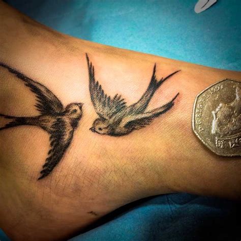 Two Pretty Swallow Bird Tattoo On Foot Tattooimages