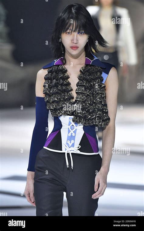 model sora choi walks on the runway during the louis vuitton fashion show during paris fashion