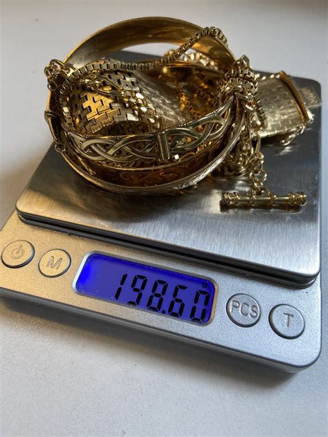 Scale Weighing Gold National Pawnbrokers Association