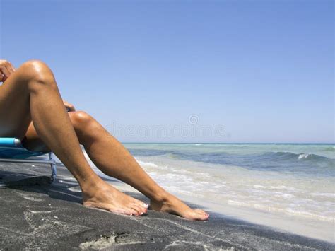 Attractive Female Legs Relaxing On A Beautiful Beach Stock Photo Image Of Tropical