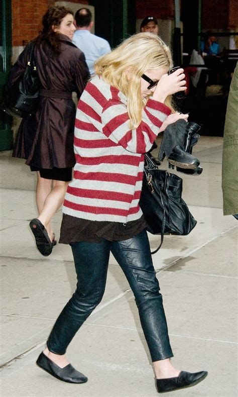 Olsens Anonymous Mary Kate Olsen Steps Out In Red Stripes Leather Pants