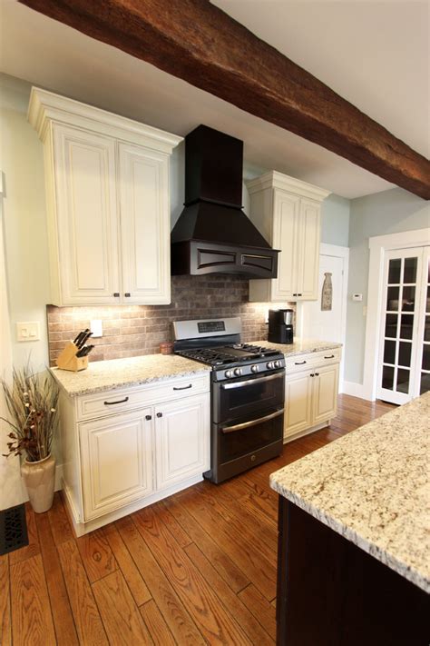 Maybe you would like to learn more about one of these? Painted Cream with Brown Glaze Cabinets with Giallo ...