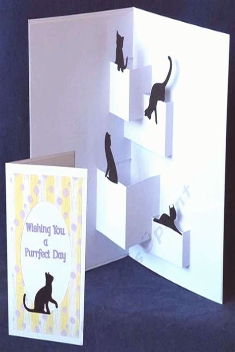 The file contains the inside pop up with cat toppers and also the outer