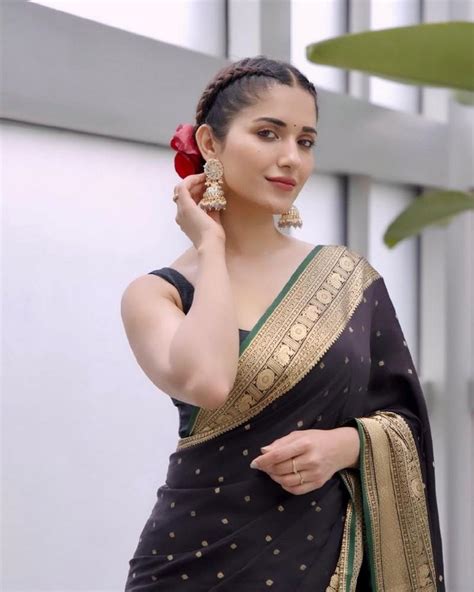Actress Ruhani Sharma Looking Gorgeous In Black Saree Telugu Rajyam