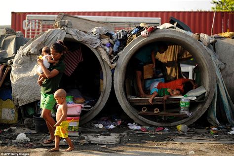Pictures Show Families Forced To Live In Pipes In Manilas Sprawling