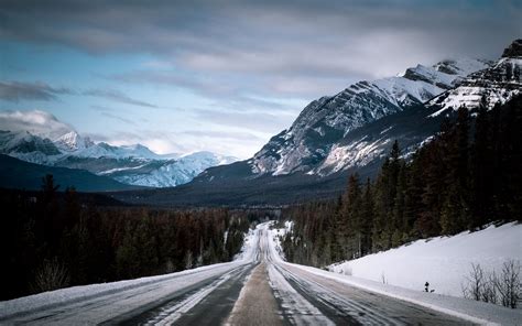 Download Wallpaper 2560x1600 Road Mountains Slope Snowy Widescreen