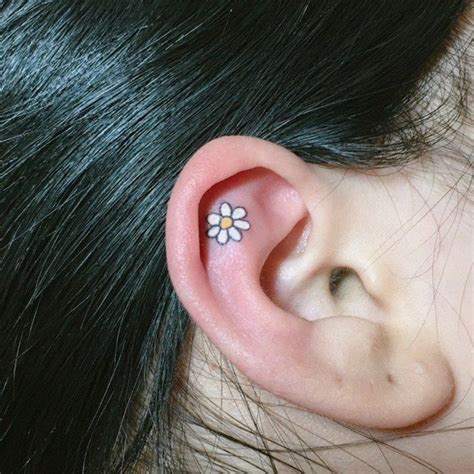18 Tiny Tattoos That Are Prettier Than Any Piercing Inner Ear Tattoo Ear Tattoo Tiny Tattoos