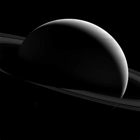 Cassini Captures Dark Sides Of Saturn And Tethys Scinews