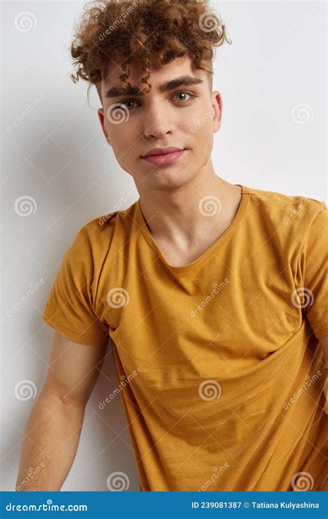 Kinky Guy In Yellow T Shirts Gesture Hands Emotions Lifestyle Unaltered